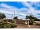 Weston Hills Park sign with community branding and desert landscaping at 132 Soaring Sky Ave, Henderson, NV 89011