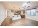 Open concept kitchen with an island, stainless steel appliances, and a breakfast bar at 132 Soaring Sky Ave, Henderson, NV 89011