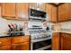 The kitchen showcases modern stainless steel appliances and plenty of countertop space for meal prep at 132 Soaring Sky Ave, Henderson, NV 89011
