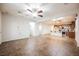 Spacious living room showcasing open floor plan, tiled flooring, recessed lighting, and great natural light at 132 Soaring Sky Ave, Henderson, NV 89011