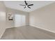 Bright and airy bedroom with ceiling fan and sliding glass doors offering ample natural light at 2007 Cutlass Dr # 0, Henderson, NV 89014