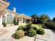 Landscaped backyard with green grass and attractive plants at 2017 Eagle Trace Way, Las Vegas, NV 89117