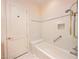 Bright, neutral bathroom features tiled walls, shower niche and bench at 2017 Eagle Trace Way, Las Vegas, NV 89117
