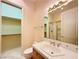 Bathroom with vanity, walk-in closet, and glass shower at 2017 Eagle Trace Way, Las Vegas, NV 89117