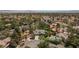 Aerial view of property with mature trees in a residential neighborhood at 2222 Lucerne Ct, Henderson, NV 89014