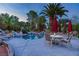 Beautiful backyard pool area surrounded by tropical landscaping at 2222 Lucerne Ct, Henderson, NV 89014