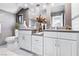 Elegant bathroom with gray walls, double vanity, and modern fixtures at 2222 Lucerne Ct, Henderson, NV 89014