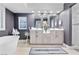 Modern bathroom featuring a soaking tub, double vanity, and contemporary finishes at 2222 Lucerne Ct, Henderson, NV 89014