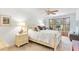 Bright bedroom featuring a bay window, wooden blinds and nightstands at 2222 Lucerne Ct, Henderson, NV 89014