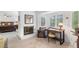 View of the bedroom including a desk and a fire place at 2222 Lucerne Ct, Henderson, NV 89014