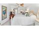 Comfortable bedroom with neutral paint, mounted TV, and dresser at 2222 Lucerne Ct, Henderson, NV 89014