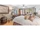 A comfortable bedroom featuring a cozy bed and bay window at 2222 Lucerne Ct, Henderson, NV 89014