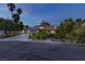 Charming single-story home with a well-manicured lawn and mature landscaping at 2222 Lucerne Ct, Henderson, NV 89014