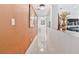 Hallway with ceramic tile and neutral paint, leading into another room at 2222 Lucerne Ct, Henderson, NV 89014