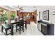 Inviting eat-in kitchen with wood cabinets, granite countertops, stainless steel appliances, and an island for ample prep space at 2222 Lucerne Ct, Henderson, NV 89014