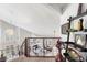 Bright living room featuring high ceilings, fireplace, and modern railing at 2222 Lucerne Ct, Henderson, NV 89014