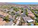 Neighborhood aerial view showcasing the beautiful homes, mature trees, and manicured lawns at 2544 Ashley Rose Ter, Henderson, NV 89052