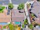 Charming home featuring mature trees, a well-manicured lawn, and a spacious driveway at 2544 Ashley Rose Ter, Henderson, NV 89052