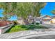 Charming single-story home features a well-manicured lawn and mature shade tree at 2544 Ashley Rose Ter, Henderson, NV 89052