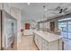 Spacious kitchen features a large island, stainless steel appliances, and open layout to the living room at 2544 Ashley Rose Ter, Henderson, NV 89052