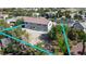 Aerial view of a vacant lot ready for development in a neighborhood with tall trees at 276 Glenridding St, Las Vegas, NV 89183