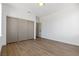 Bedroom with hardwood floors, closet and doorway at 276 Glenridding St, Las Vegas, NV 89183