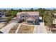 Expansive two-story home with a well-manicured yard and long private drive at 276 Glenridding St, Las Vegas, NV 89183