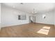 Bright, open living room with hardwood floors, white walls, and natural light at 276 Glenridding St, Las Vegas, NV 89183