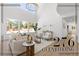 Bright living room with hardwood floors, high ceilings, and large windows at 276 Glenridding St, Las Vegas, NV 89183