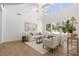 Sun-drenched living room featuring hardwood floors and an open floor plan at 276 Glenridding St, Las Vegas, NV 89183