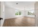 Open living room featuring new hardwood floors and natural light at 276 Glenridding St, Las Vegas, NV 89183