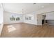 Spacious living room featuring wood floors and great natural light at 276 Glenridding St, Las Vegas, NV 89183