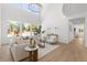Bright living room with hardwood floors, high ceilings, and natural light at 276 Glenridding St, Las Vegas, NV 89183