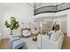 Open-concept living room with hardwood floors and abundant natural light at 276 Glenridding St, Las Vegas, NV 89183