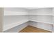 This pantry features all white walls and shelving at 276 Glenridding St, Las Vegas, NV 89183