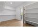 Spacious walk-in closet with shelving and rod for optimal storage at 276 Glenridding St, Las Vegas, NV 89183