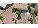 Aerial view of backyard featuring desert landscaping and a covered patio area at 3157 Faiss Dr, Las Vegas, NV 89134