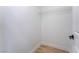 Walk-in closet with a single shelf and ample space for organization, and wood-look floors at 3157 Faiss Dr, Las Vegas, NV 89134