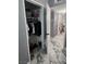 Bedroom walk-in closet for storage; opens to bedroom with marble flooring at 324 Princeton St, Las Vegas, NV 89107