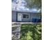 Cozy single-story home with a well-maintained lawn and blue exterior paint at 324 Princeton St, Las Vegas, NV 89107