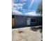 Charming single-story home with a freshly painted grey exterior and a white door at 324 Princeton St, Las Vegas, NV 89107