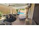 Backyard with a covered patio area, an outdoor bar, and a swimming pool at 3355 Royal Bay Dr, Las Vegas, NV 89117