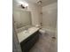 Well-lit bathroom featuring a shower and bath combination and updated vanity at 3585 Arville St # 403A, Las Vegas, NV 89103