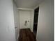 Hallway with view into laundry area and adjacent bathroom at 3585 Arville St # 403A, Las Vegas, NV 89103