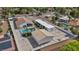 Aerial view of a home featuring a pool, detached garage, basketball court, and desert landscaping at 3630 Tobias Ln, Las Vegas, NV 89120