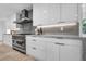 Well-equipped kitchen boasts marble countertops, stainless steel appliances, and ample cabinet space at 3630 Tobias Ln, Las Vegas, NV 89120