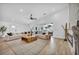 Bright living room with comfortable seating, access to the backyard, and modern design elements at 3630 Tobias Ln, Las Vegas, NV 89120