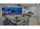 Stylish outdoor living area with comfortable seating, overlooking a pool and landscaped backyard at 3630 Tobias Ln, Las Vegas, NV 89120