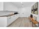 Bright room featuring white built-in cabinets, ample storage, and sleek countertops at 3630 Tobias Ln, Las Vegas, NV 89120