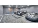 Home theater with plush seating, tiered platforms, and a cozy beanbag for ultimate entertainment at 3630 Tobias Ln, Las Vegas, NV 89120